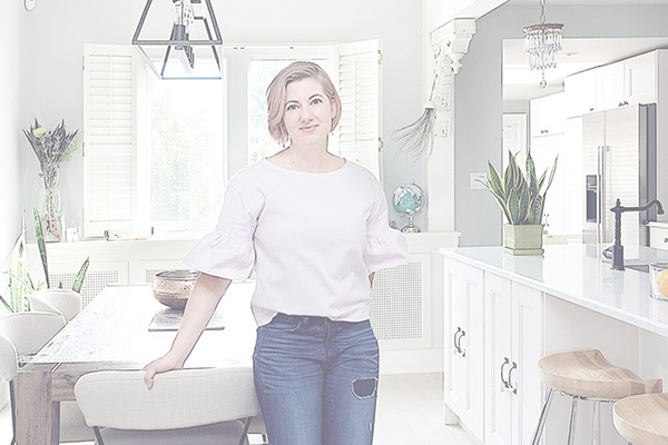 Melissa Peretti Standing in Kitchen